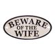 A CAST IRON BEWARE OF THE WIFE" PLAQUE"