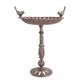 A CAST IRON BIRD BATH ON STAND