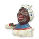 A CAST IRON BLACK GIRL MECHANICAL BANK