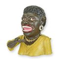 A CAST IRON BLACK LADY MECHANICAL BANK
