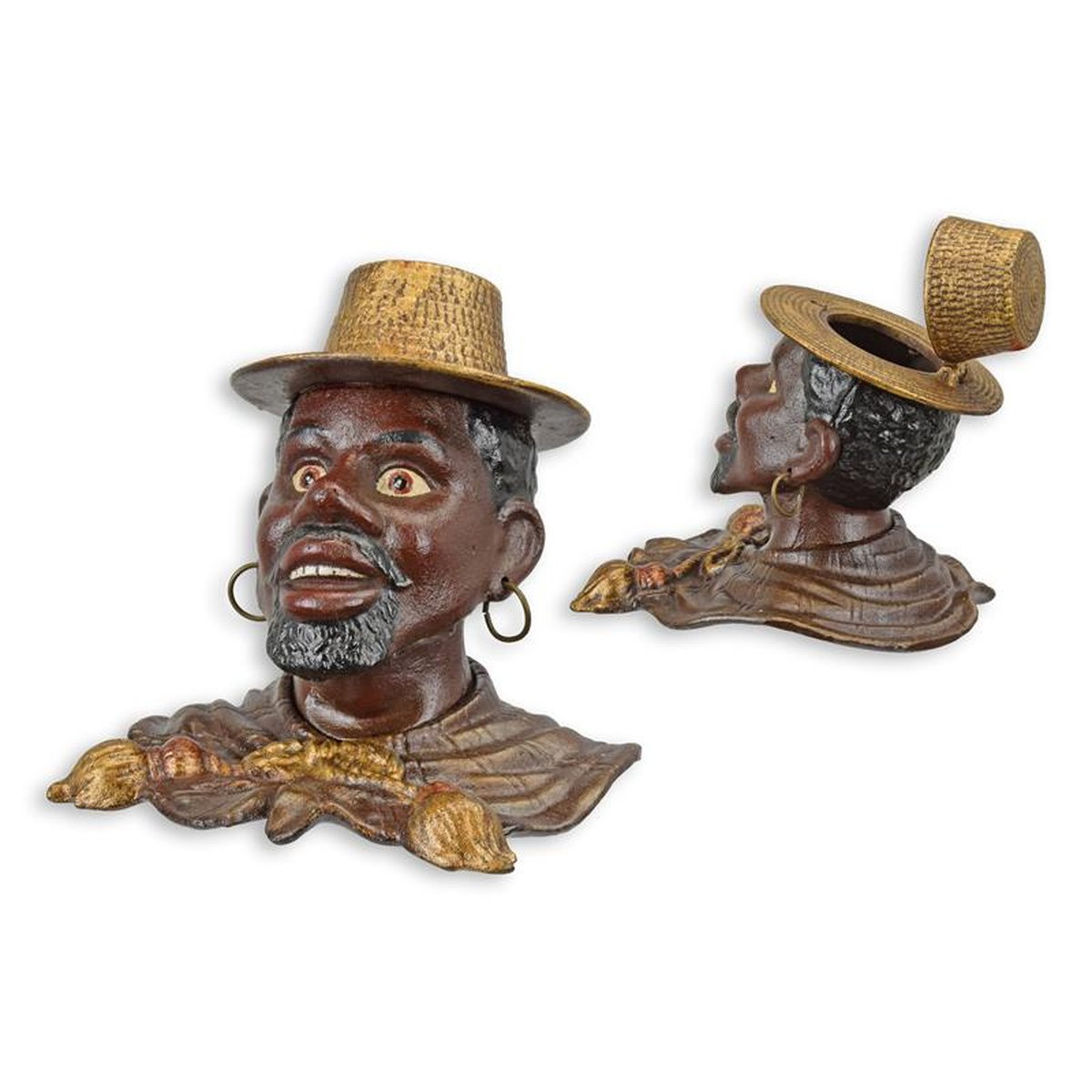 A CAST IRON BLACK MAN WITH STRAW HAT INKWELL