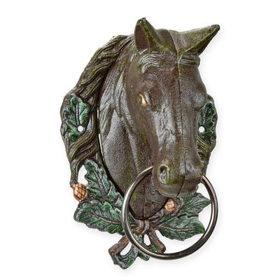 A CAST IRON BROWN HORSEHEAD TOWEL HOLDER