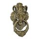 A CAST IRON DEVIL FACE DOOR KNOCKER - BRONZE COLOUR