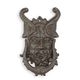 A CAST IRON DEVIL FACE DOOR KNOCKER