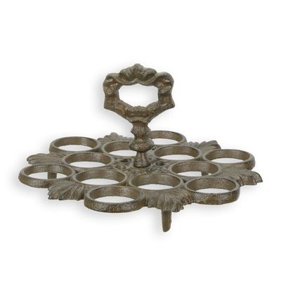 A CAST IRON EGG STAND