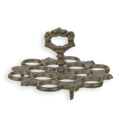 A CAST IRON EGG STAND