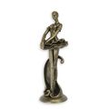 A CAST IRON FIGURINE OF A BALLERINA - BRONZE COLOURED