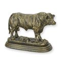 A CAST IRON FIGURINE OF A BULL
