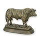 A CAST IRON FIGURINE OF A BULL