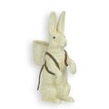 A CAST IRON FIGURINE OF A BUNNY WITH BASKET