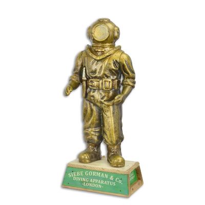A CAST IRON FIGURINE OF A DIVER ON WOODEN BASE