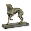 A CAST IRON FIGURINE OF A GREYHOUND