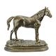 A CAST IRON FIGURINE OF A HORSE