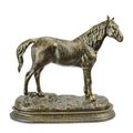 A CAST IRON FIGURINE OF A HORSE