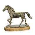 A CAST IRON FIGURINE OF A HORSE