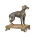 A CAST IRON FIGURINE OF A HOUND MOUNTED ON WOODEN BASE