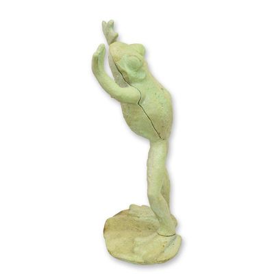 A CAST IRON FIGURINE OF A LEAPING FROG