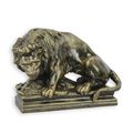 A CAST IRON FIGURINE OF A LION AND HOG