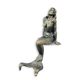 A CAST IRON FIGURINE OF A MERMAID