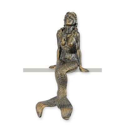 A CAST IRON FIGURINE OF A MERMAID