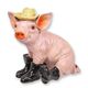 A CAST IRON FIGURINE OF A PIG IN BOOTS