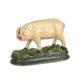A CAST IRON FIGURINE OF A PIG