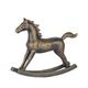 A CAST IRON FIGURINE OF A ROCKING HORSE
