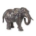 A CAST IRON FIGURINE OF AN ELEPHANT