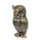 A CAST IRON FIGURINE OF AN OWL