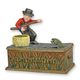 A CAST IRON FISHERMAN MECHANICAL BANK