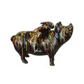 A CAST IRON FLYIN PIG BANK - DRIP ART. BLACK