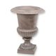 A CAST IRON GARDEN URN - BROWN