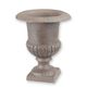 A CAST IRON GARDEN URN - BROWN