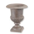 A CAST IRON GARDEN URN - BROWN