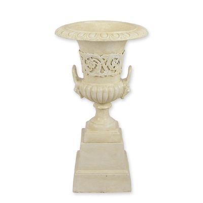 A CAST IRON GARDEN URN ON BASE