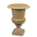 A CAST IRON GARDEN URN - RUST