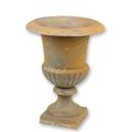 A CAST IRON GARDEN URN - RUST