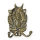 A CAST IRON HORSEHEAD COAT HOOK