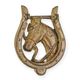 A CAST IRON HORSESHOE DOOR KNOCKER