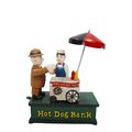 A CAST IRON HOT DOG STAND MECHANICAL BANK