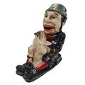 A CAST IRON KICKING PIG MECHANICAL BANK