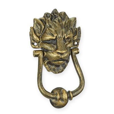A CAST IRON LION HEAD DOOR KNOCKER