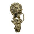 A CAST IRON LION HEAD DOOR KNOCKER