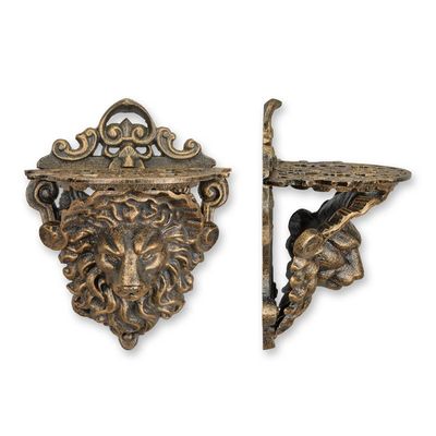 A CAST IRON LION HEAD WALL CONSOLE - BRONZE LOOK