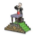 A CAST IRON MAGICIAN MECHANICAL BANK