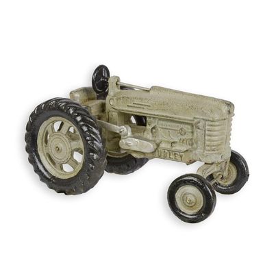 A CAST IRON MODEL OF A TRACTOR