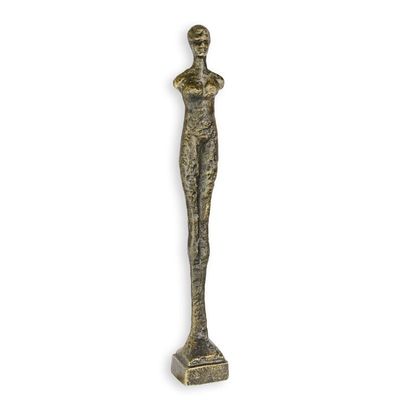 A CAST IRON MODERNIST SCULPTURE OF A STANDING WOMAN