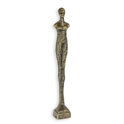 A CAST IRON MODERNIST SCULPTURE OF A STANDING WOMAN