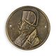 A CAST IRON NAPOLEON PLAQUE