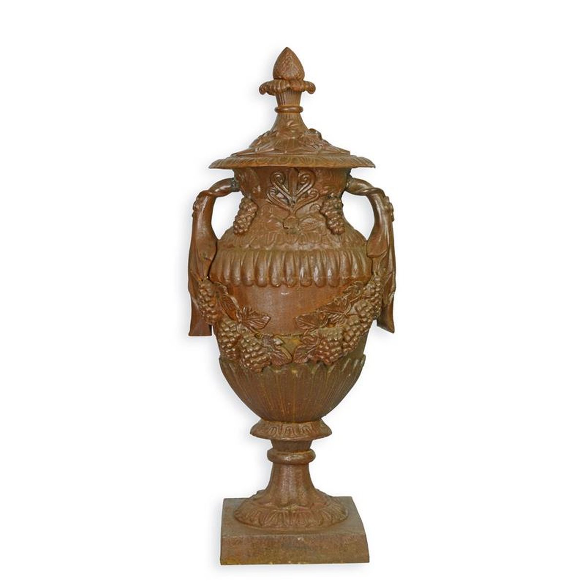 A CAST IRON ORNAMENTAL GARDEN URN ON STAND, RUST LOOK